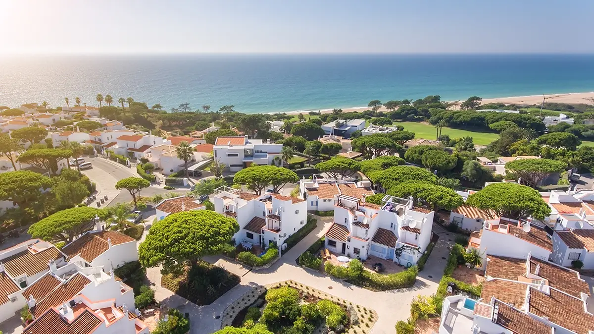 Typical residential area with villas by the Algarve coast.