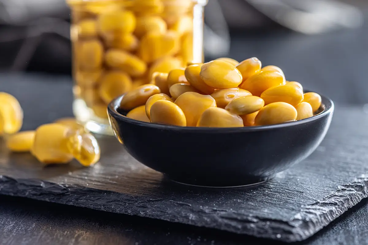 Picture of a bowl of Tremoços, one of the most essential Portuguese tapas.