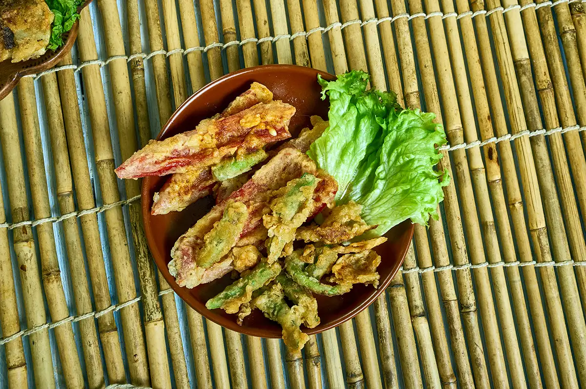 A vegetarian petisco using no meat, peixinhos da horta are baked green beans in batter, and a delicious Portuguese tapa.