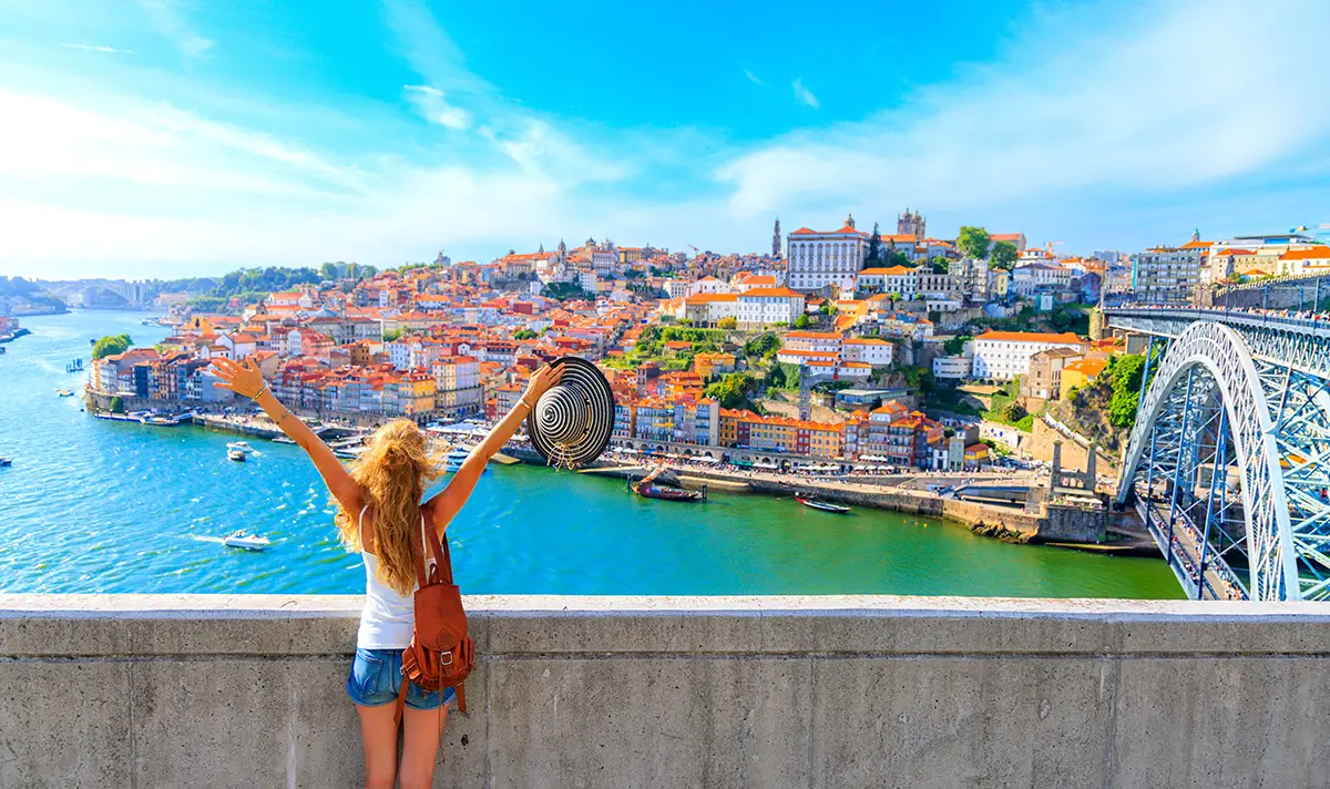 Woman enjoying the view at the old town of Porto.