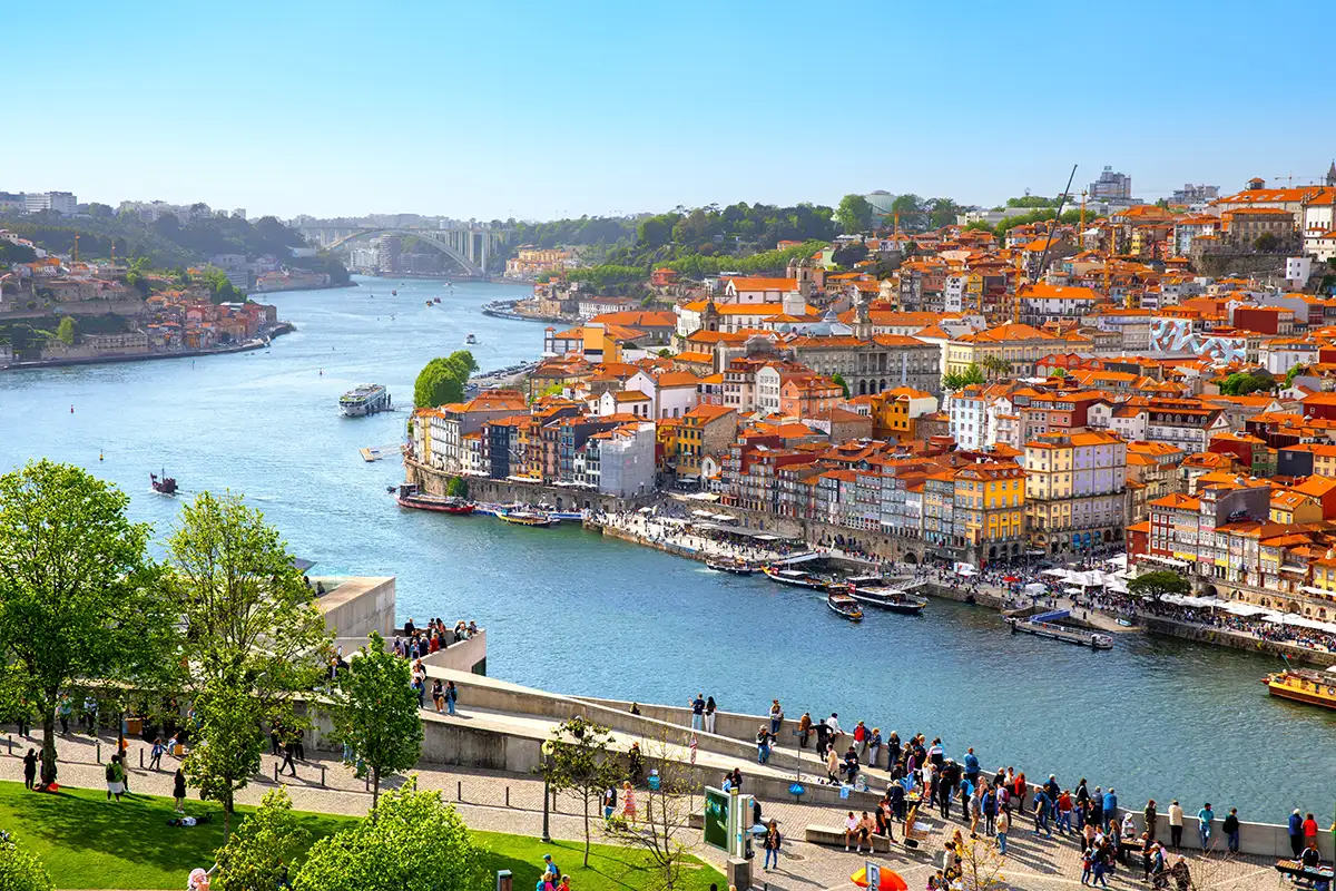 View of Porto, Portugal's second-largest city, and the Douro River, known for its Valley and its Port wine production.