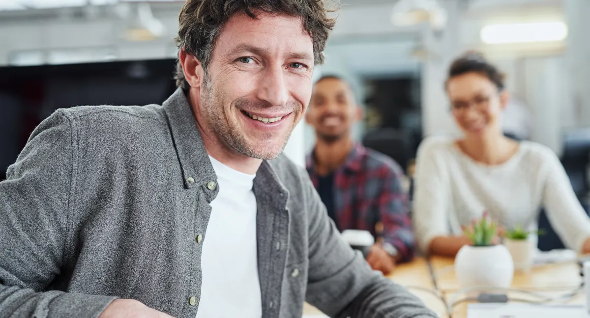 Smiling Entrepreneur after closing out an investment deal in Lisbon.