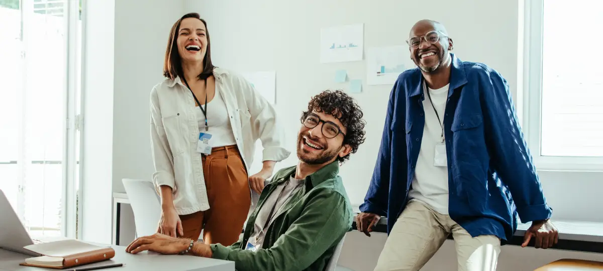 Friendly expats collaborating in one of Lisbon's many co-working spaces.